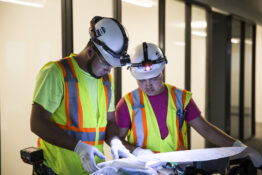 FZ electricians examining blue prints for Lifeway Christian Resources Building