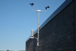 An electrical apparatus attached to the outside of a building