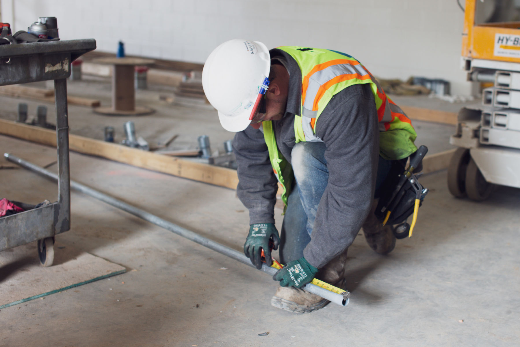 electrician measuring conduit GR bio