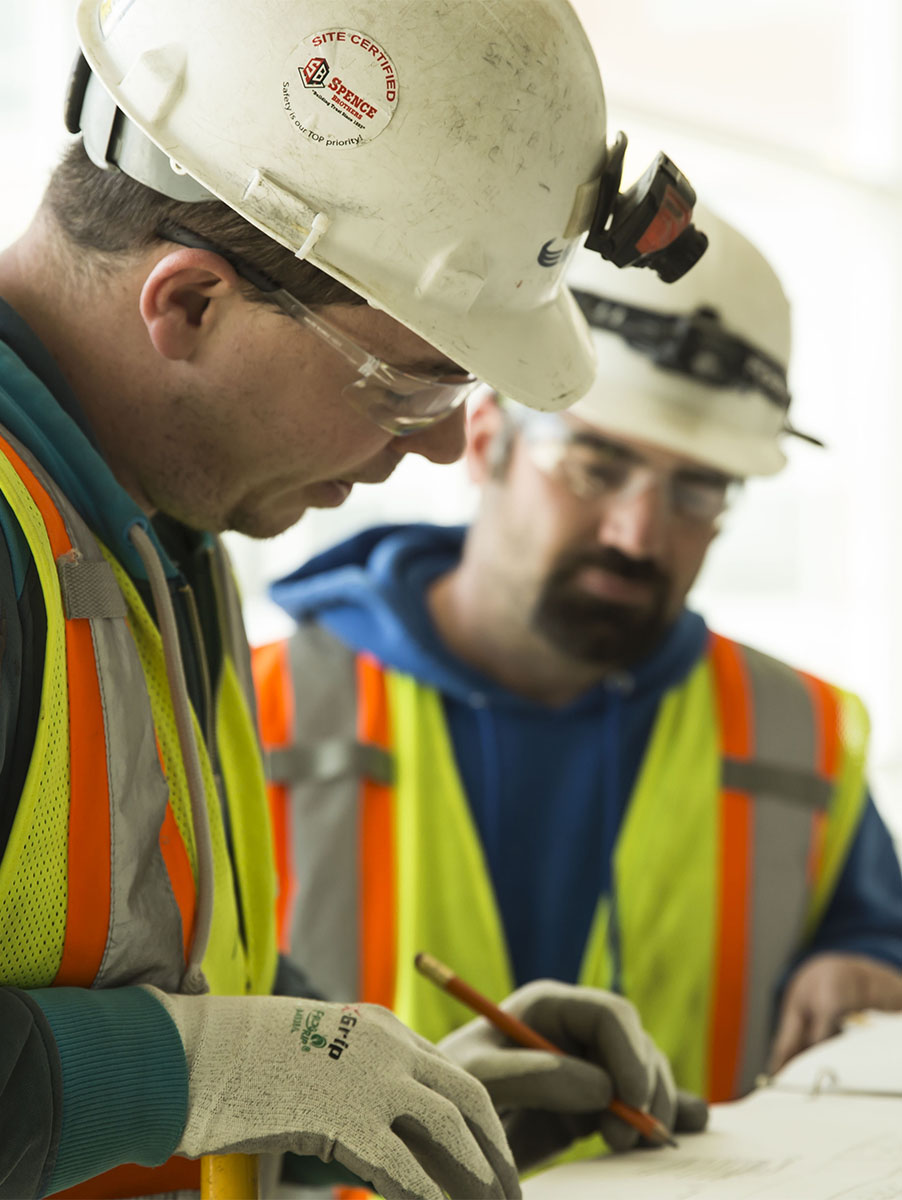 IMG_0763_8060 cropped electricians working on blueprint