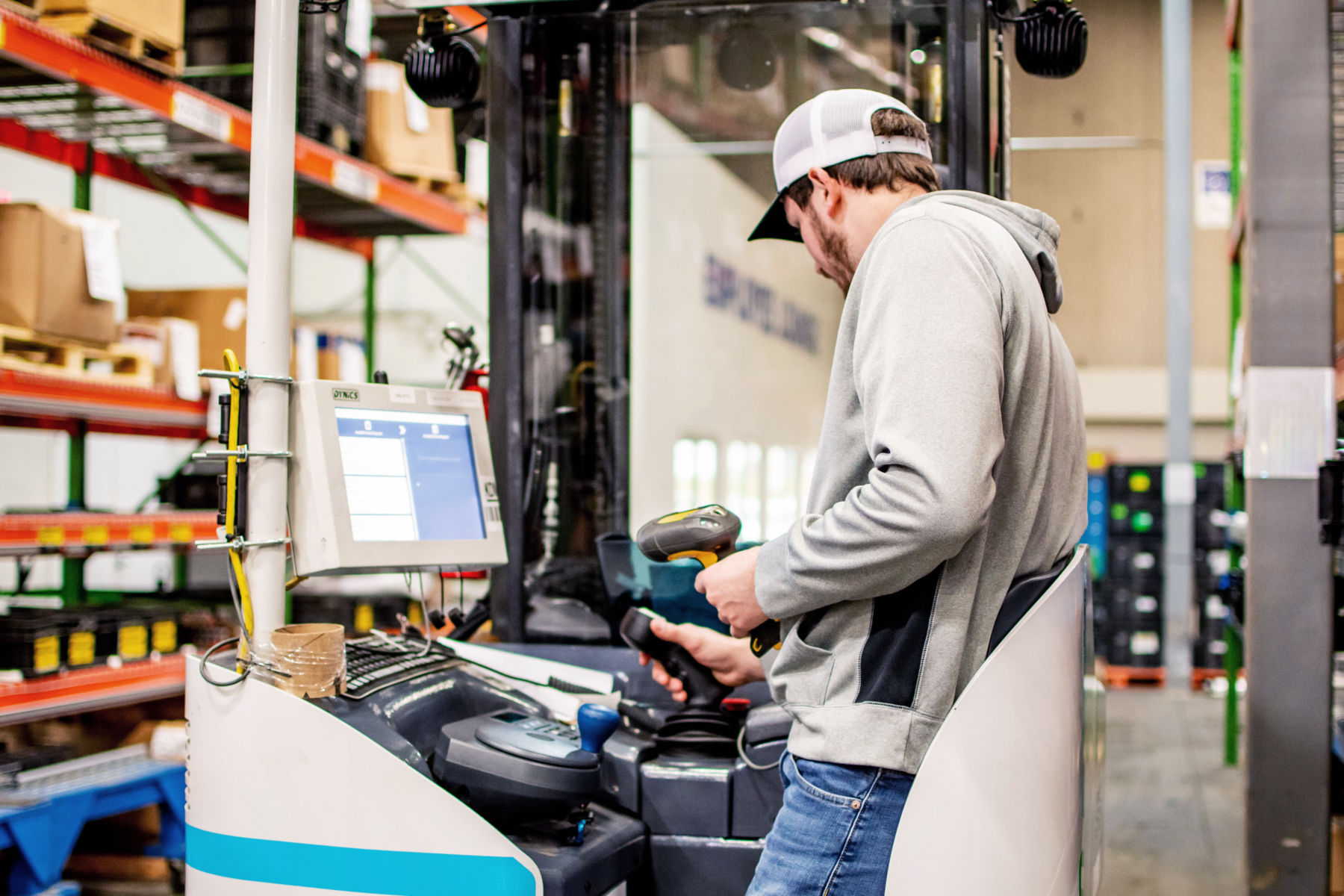 man working with a pick to light system