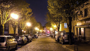 town street with outdoor lighting at night