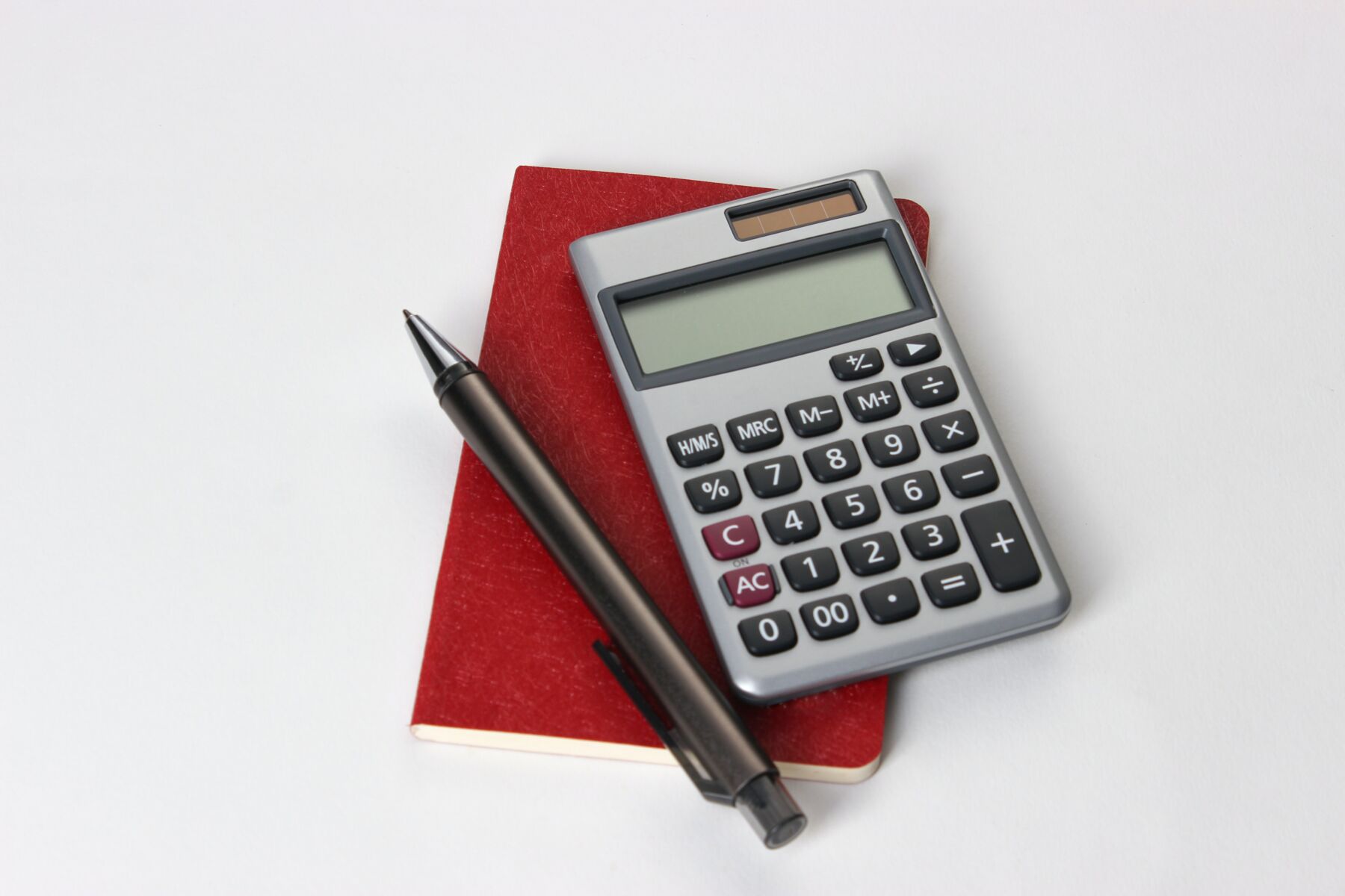 calculator and a pen - cost of an industrial generator