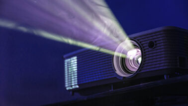 projector shining light, audio visual system av technology