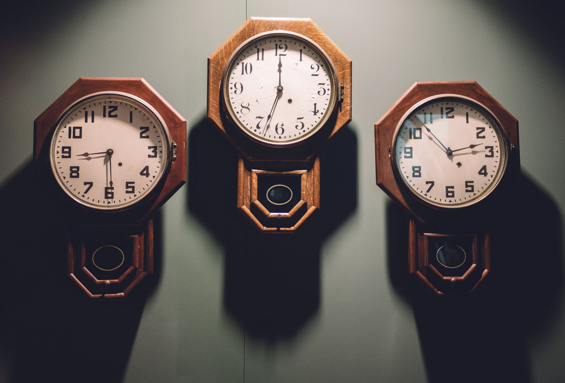 history of MES and IIoT Blog post - photo of three clocks