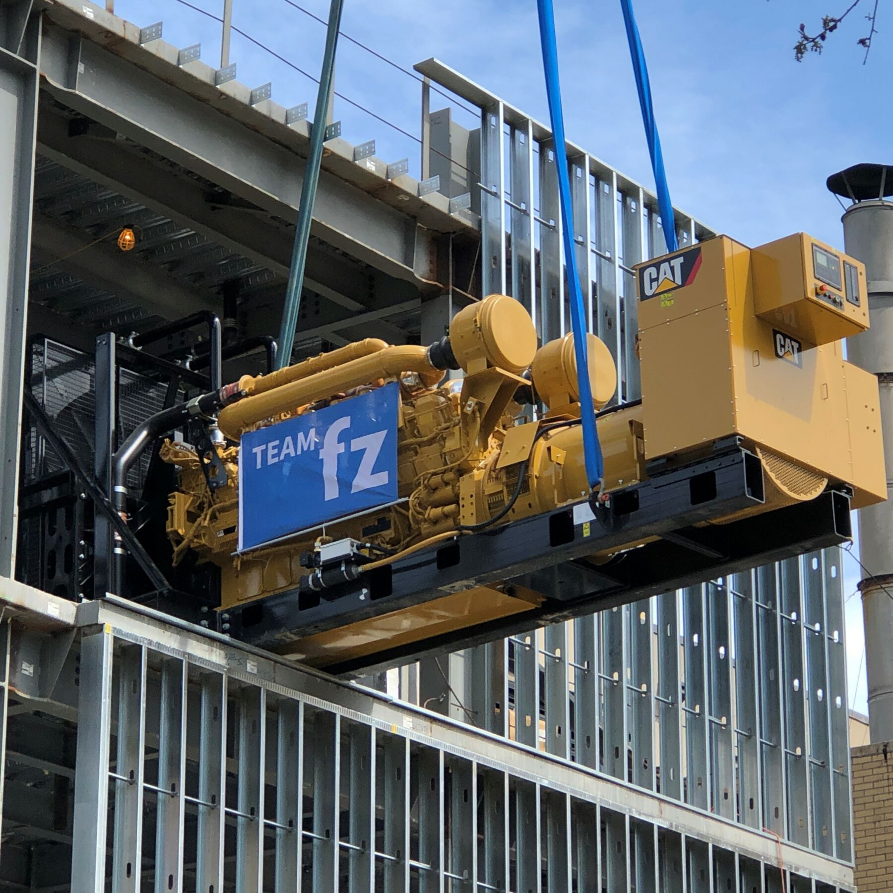 Generator being lifted up to a high floor