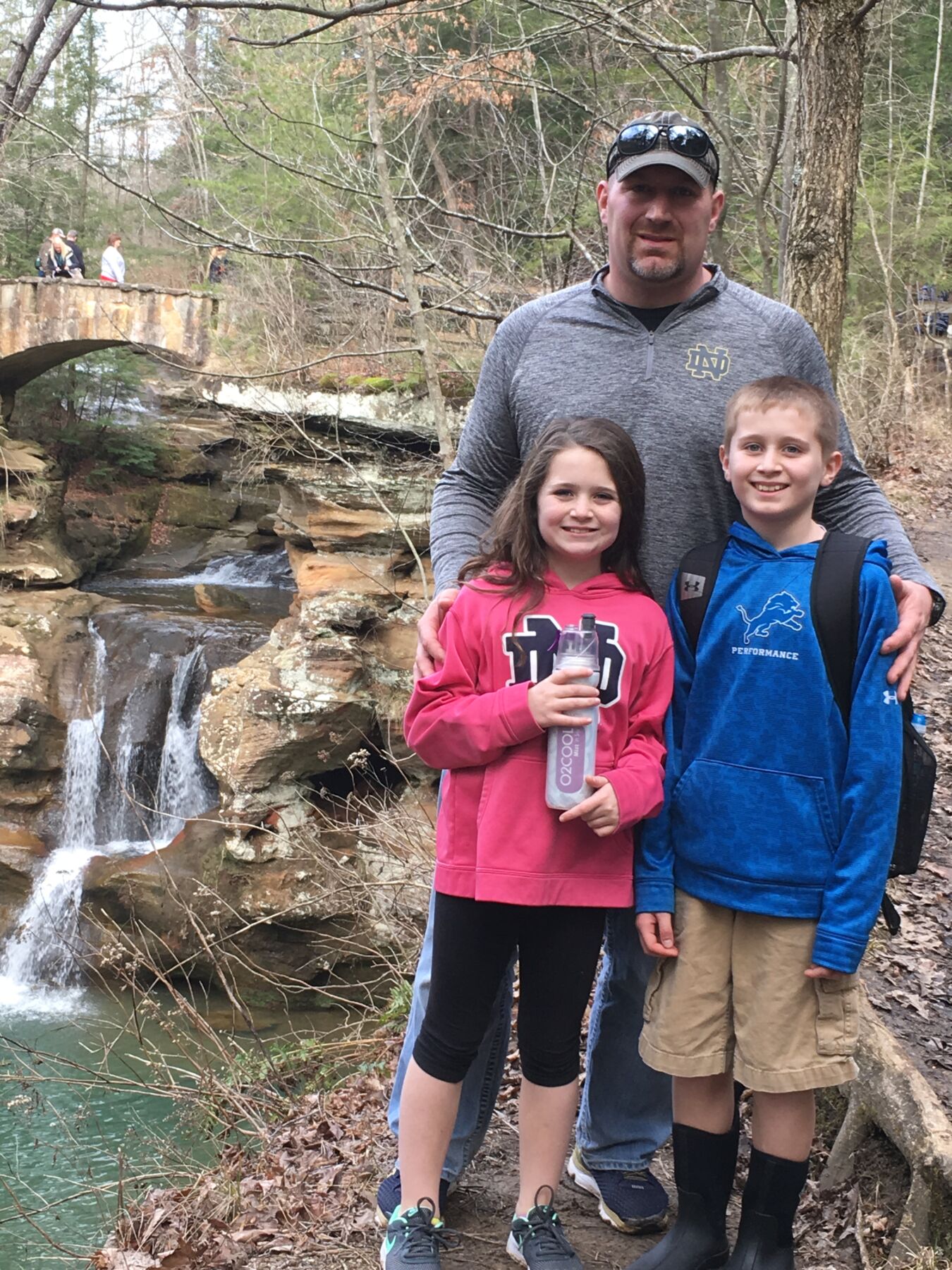 Greg Klein and his kids in the woods