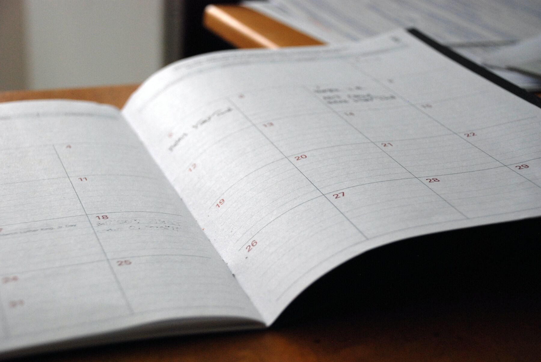 Calendar schedule on a table representing long lead times