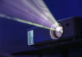 projector shining light, audio visual system