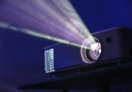 projector shining light, audio visual system av technology